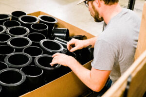 Employee organizing Tamarack core plugs